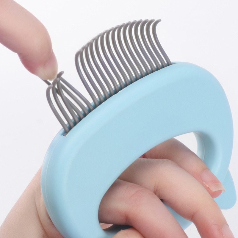 The WhiskerBrush™ Grooming & Massage Comb